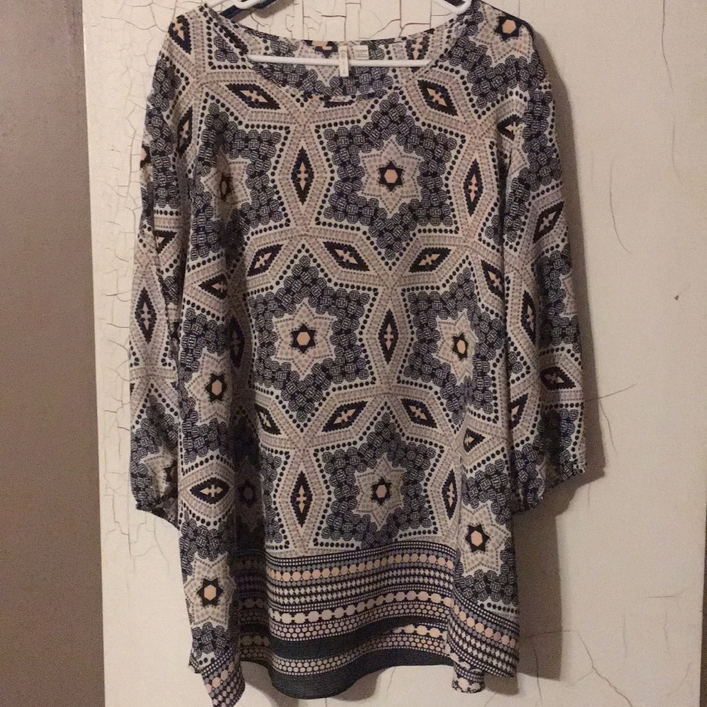 Dressy top with slits on arms
